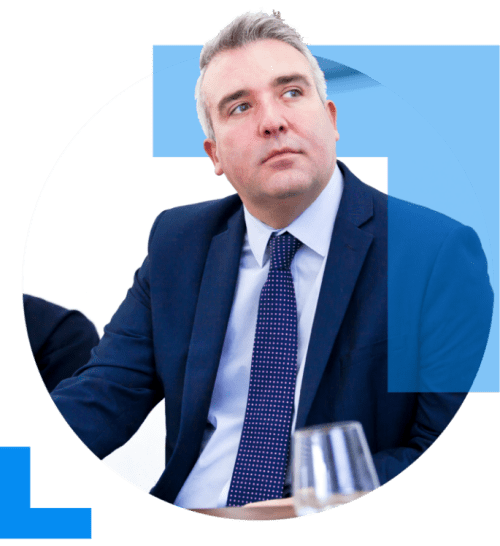 A circular KBS Corporate branded icon featuring a business sales professional.