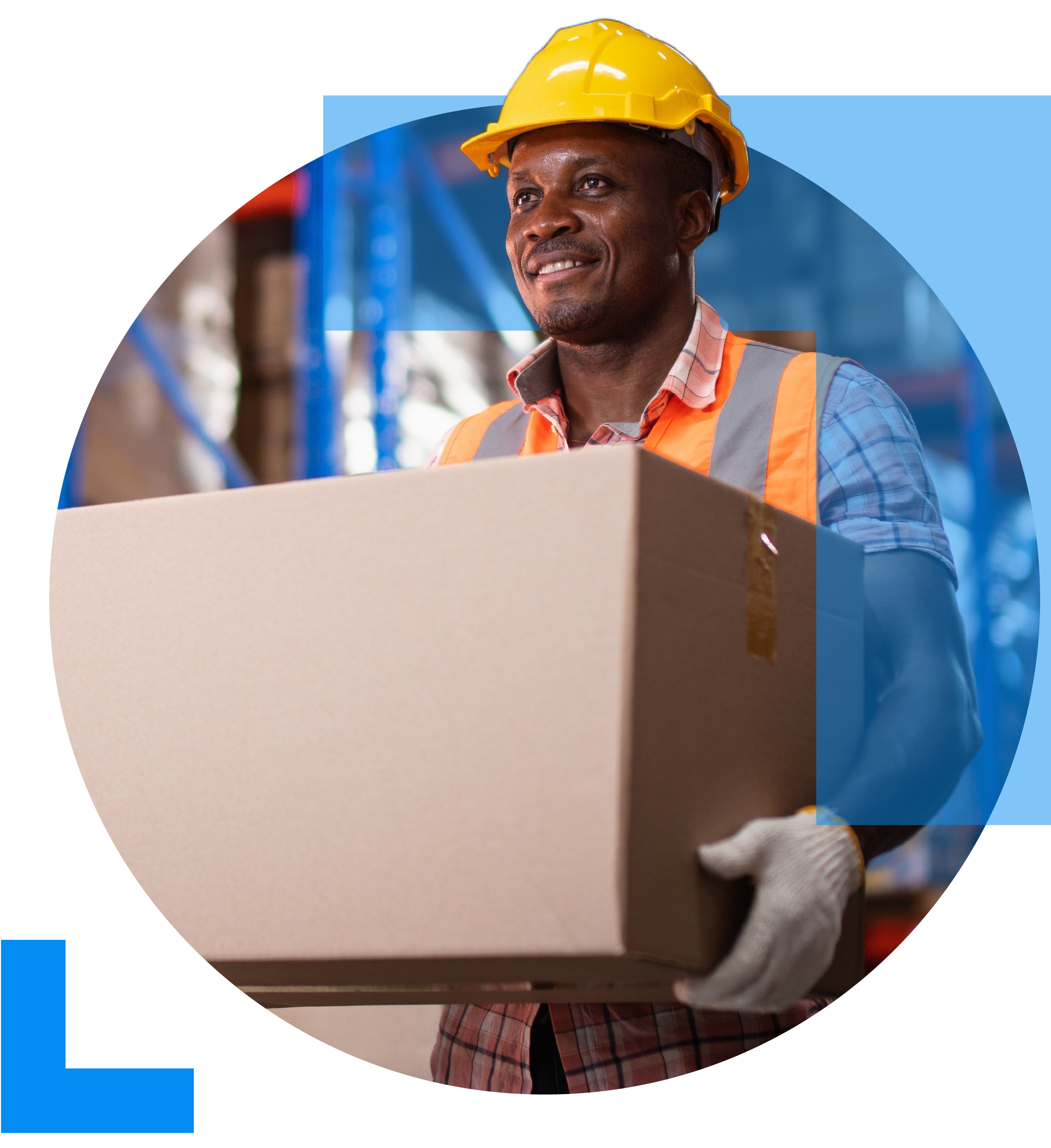A man in work clothing and a yellow hard hat, carrying a large parcel in a warehouse setting, furfilling an online order, representing the E-commerce sector.