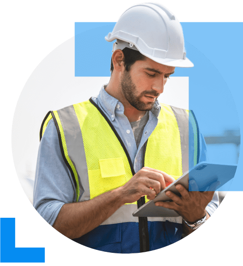 An engineer wearing a hard hat and a high visibility jacket. working on a tablet, overseeing engineering activities, representing the engineering sector.