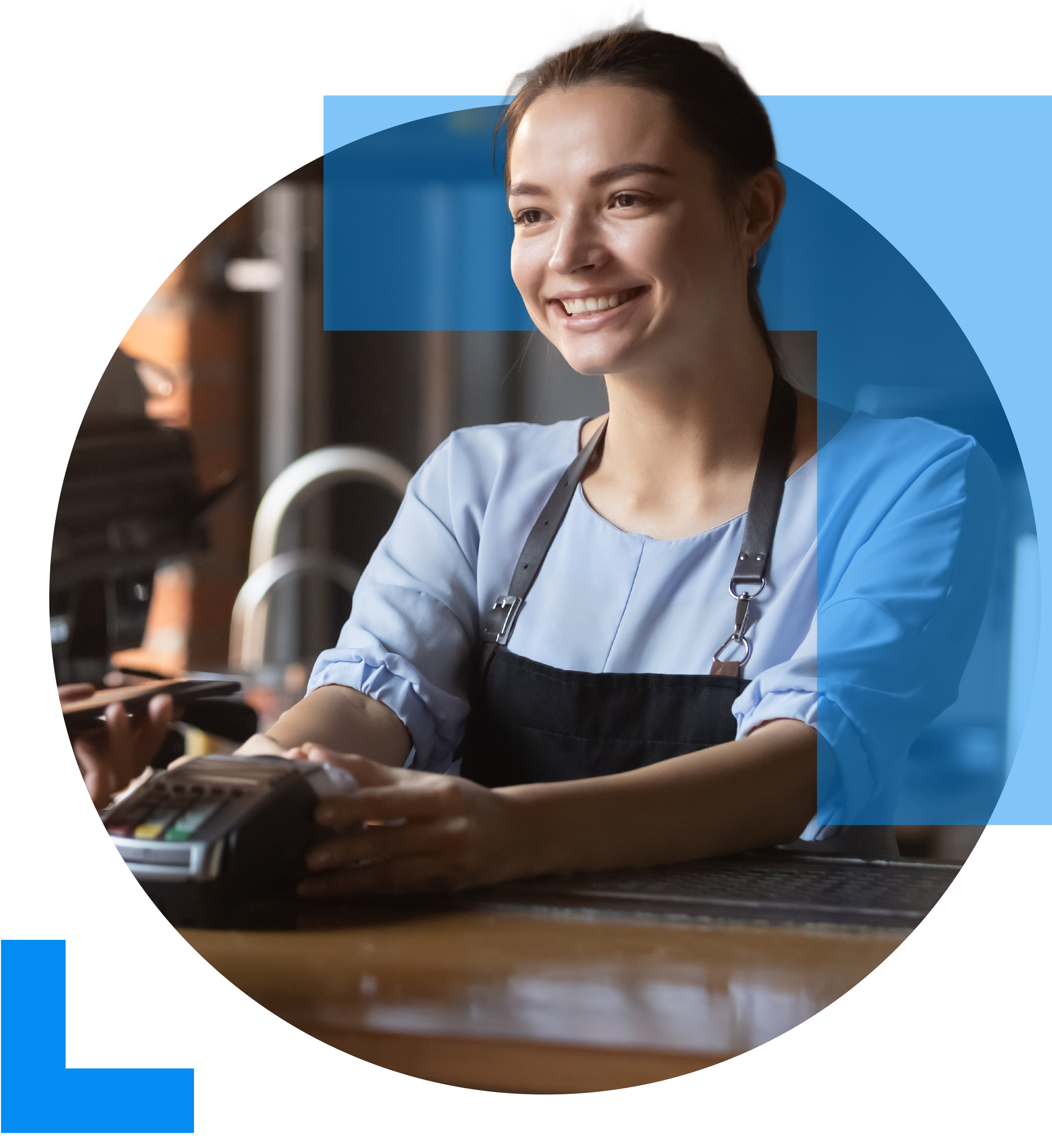 A friendly cashier presents a card machine at a counter in a retail setting, symbolising the Retail sector.
