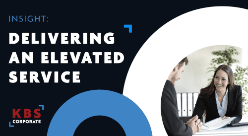 KBS Corporate banner with the headline ‘INSIGHT: DELIVERING AN ELEVATED SERVICE,’ featuring two professionals in conversation at a desk.