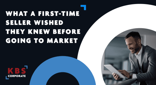 Confident businessman smiling at tablet. With text "What a first-time seller wished they knew before going to market"